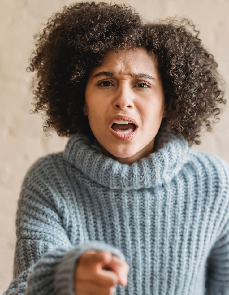 Woman reacting with anger